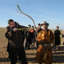 While in Mongolia as UNDP Goodwill Ambassador, Crown Prince Haakon tested his archery skills supported by herder Gantuya.  For editorial use only - not for sale. Photo: D. Rentsendorj, MONTSAME news agency. Picture size: 2144 x 1424 px 1,80 MB.